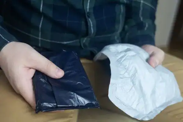 image of man holding stool incontinence Blackpool products